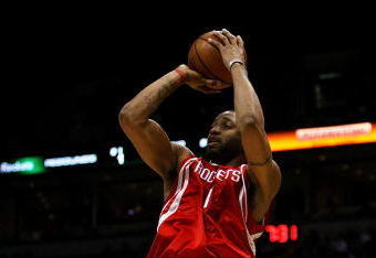 MILWAUKEE - FEBRUARY 09: Tracy McGrady #1 of the Houston Rockets puts up a shot over Keith Bogans #10 of the Milwaukee Bucks on February 9, 2009 at the Bradley Center in Milwaukee, Wisconsin. The Bucks defeated the Rockets 124-112. NOTE TO USER: User expressly acknowledges and agreees that, by downloading and/or using this Photograph, User is consenting to the terms and conditions of the Getty Images License Agreement. (Photo by Jonathan Daniel/Getty Images)