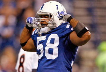 INDIANAPOLIS - DECEMBER 13: Gary Brackett #58 of the Indianapolis Colts celebrates during the NFL game against the Denver Broncos at Lucas Oil Stadium on December 13, 2009 in Indianapolis, Indiana. The Colts won 28-16. (Photo by Andy Lyons/Getty Images)