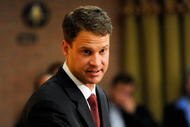 LOS ANGELES, CA - JANUARY 13: Lane Kiffin (L) the new college football coach of University of Southern California speaks during a news conference at Heritage Hall on the campus of USC on January 13, 2010 in Los Angeles, California. (Photo by Kevork Djansezian/Getty Images)