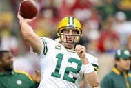 GLENDALE, AZ - JANUARY 10: Quarterback Aaron Rodgers #12 of the Green Bay Packers warms up before the 2010 NFC wild-card playoff game against the Arizona Cardinals at University of Phoenix Stadium on January 10, 2010 in Glendale, Arizona. (Photo by Christian Petersen/Getty Images)