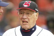 WINTER HAVEN , FL - MARCH 3: Eric Wedge, manager of the Cleveland Indians, talks to former Indian and Hall of Fame pitcher Bob Feller before a Spring Training game against the Houston Astros on March 3, 2005 at Chain O Lakes Park in Winter Haven, Florida. The Indians won 7-3. (Photo by Rick Stewart/Getty Images)