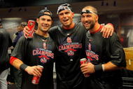 DENVER - SEPTEMBER 26:  (L-R) Skip Schumaker, Rick Ankiel and Mark DeRosa of the St. Louis Cardinals celebrate in the clubhouse after clinching the National League Central Division by defeating the Colorado Rockies at Coors Field on September 26, 2009 in Denver, Colorado. The Cardinals defeated the Rockies 6-3.  (Photo by Doug Pensinger/Getty Images)