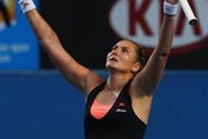 MELBOURNE, AUSTRALIA - JANUARY 22: Nadia Petrova of Russia celebrates after winning her third round match against Kim Clijsters of Belgium during day five of the 2010 Australian Open at Melbourne Park on January 22, 2010 in Melbourne, Australia. (Photo by Quinn Rooney/Getty Images)