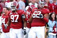 TUSCALOOSA, AL - OCTOBER 24:  Lorenzo Washington #97 celebrates with Terrence Cody #62 of the Alabama Crimson Tide after Cody blocked a field goal in the first half against the Tennessee Volunteers at Bryant-Denny Stadium on October 24, 2009 in Tuscaloosa, Alabama.  (Photo by Kevin C. Cox/Getty Images)
