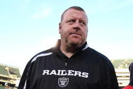 OAKLAND, CA - JANUARY 03: Head coach Tom Cable of the Oakland Raiders walks off the field after losing to the Baltimore Ravens during an NFL game at Oakland-Alameda County Coliseum on January 3, 2010 in Oakland, California. (Photo by Jed Jacobsohn/Getty Images)