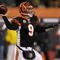 CINCINNATI - JANUARY 9:  Quarterback Carson Palmer #9 of the Cincinnati Bengals passes the ball in the fourth quarter against the New York Jets during the 2010 AFC wild-card playoff game at Paul Brown Stadium on January 9, 2010 in Cincinnati, Ohio. (Photo by Jonathan Daniel/Getty Images)
