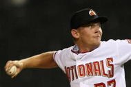 PHOENIX - OCTOBER 16: Washington Nationals prospect Stephen Strasburg #37, playing for the Phoenix Desert Dogs, pitches in the Arizona Fall League game against the Scottsdale Scorpions at Phoenix Municipal Stadium on October 16, 2009 in Phoenix, Arizona. (Photo by Christian Petersen/Getty Images)