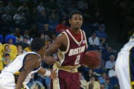 ANN ARBOR, MI - DECEMBER 1:  Guard Troy Bell #2 of the Boston College Eagles dribbles the ball against guard Avery Queen #1 of the Michigan Wolverines during the game at Crisler Arena in Ann Arbor, Michigan on December 1, 2001.  Boston College defeated Michigan 83-74.  (Photo by Danny Moloshok/Getty Images) 