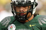 PASADENA, CA - JANUARY 01: Quarterback Jeremiah Masoli #8 of the Oregon Ducks jogs off the field during the game against the Ohio State Buckeyes in the 96th Rose Bowl game on January 1, 2010 in Pasadena, California. (Photo by Stephen Dunn/Getty Images)