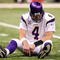 NEW ORLEANS - JANUARY 24:  Brett Favre #4 of the Minnesota Vikings sits on the turf after getting knocked down on a play against the New Orleans Saints during the NFC Championship Game at the Louisana Superdome on January 24, 2010 in New Orleans, Louisiana.  (Photo by Ronald Martinez/Getty Images)