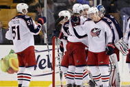 BOSTON - JANUARY 21: Samuel Pahlsson #26 and Fedor Tyutin #51 of the Columbus Blue Jackets celebrate the win over the Boston Bruins on January 21, 2010 at the TD Garden in Boston, Massachusetts. The Blue Jackets defeated the Bruins 3-2. (Photo by Elsa/Getty Images)