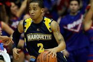 ROSEMONT, IL - JANUARY 20: Maurice Acker #2 of the Marquette Golden Eagles drives up the court against the DePaul Blue Demons at the Allstate Arena on January 20, 2010 in Rosemont, Illinois. DePaul defeated Marquette 51-50. (Photo by Jonathan Daniel/Getty Images)