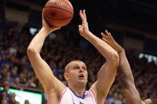 LAWRENCE, KS - DECEMBER 19:  Cole Aldrich #45 of the Kansas Jayhawks puts a shot up during the game against the Michigan Wolverines on December 19, 2009 at Allen Fieldhouse in Lawrence, Kansas. (Photo by Jamie Squire/Getty Images)
