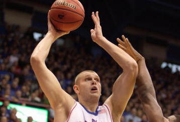 LAWRENCE, KS - DECEMBER 19:  Cole Aldrich #45 of the Kansas Jayhawks puts a shot up during the game against the Michigan Wolverines on December 19, 2009 at Allen Fieldhouse in Lawrence, Kansas. (Photo by Jamie Squire/Getty Images)