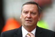 MIDDLESBROUGH, ENGLAND - APRIL 11:  Paul Duffen, the Hull City chairman walks down the touchline during the Barclays Premier League match between Middlesbrough and Hull City at the Riverside Stadium on April 11, 2009 in Middlesbrough, England  (Photo by Matthew Lewis/Getty Images)