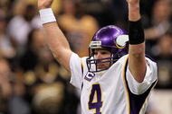 NEW ORLEANS - JANUARY 24:  Brett Favre #4 of the Minnesota Vikings reacts after the Vikings scored a touchdown against the New Orleans Saints during the NFC Championship Game at the Louisiana Superdome on January 24, 2010 in New Orleans, Louisiana. The Saints won 31-28 in overtime.  (Photo by Jed Jacobsohn/Getty Images)