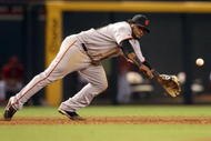 PHOENIX - SEPTEMBER 23: Infielder Pablo Sandoval #48 of the San Francisco Giants is unable to field a single hit by the Arizona Diamondbacks during the major league baseball game at Chase Field on September 23, 2009 in Phoenix, Arizona. (Photo by Christian Petersen/Getty Images)