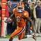 TAMPA, FL - DECEMBER 5: Wide receiver Jacoby Ford #6 of the Clemson Tigers rushes upfield with a first-quarter pass against the Georgia Tech Yellow Jackets in the 2009 ACC Football Championship Game December 5, 2009 at Raymond James Stadium in Tampa, Florida.  (Photo by Al Messerschmidt/Getty Images)