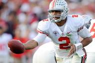 PASADENA, CA - JANUARY 01:  Quarterback Terrelle Pryor #2 of the Ohio State Buckeyes hands the ball off against the Oregon Ducks during the 96th Rose Bowl game on January 1, 2010 in Pasadena, California.  (Photo by Kevork Djansezian/Getty Images)