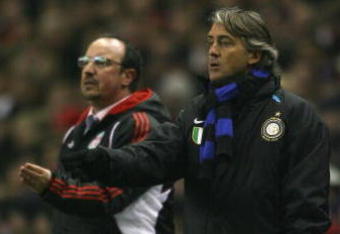 LIVERPOOL, UNITED KINGDOM - FEBRUARY 19:  Inter Milan Manager Roberto Mancini (R) and Liverpool Manager Rafael Benitez give instructions during the UEFA Champions League First Knockout Round First Leg match between Liverpool and Inter Milan at Anfield on February 19, 2008 in Liverpool, England.  (Photo by Clive Brunskill/Getty Images)