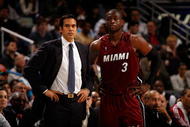 NEW ORLEANS - DECEMBER 30:  Head coach Erik Spoelstra and Dwyane Wade #3 of the Miami Heat talk during a time out during the game against the New Orleans Hornets at New Orleans Arena on December 30, 2009 in New Orleans, Louisiana.  NOTE TO USER: User expressly acknowledges and agrees that, by downloading and/or using this Photograph, User is consenting to the terms and conditions of the Getty Images License Agreement.  (Photo by Chris Graythen/Getty Images)