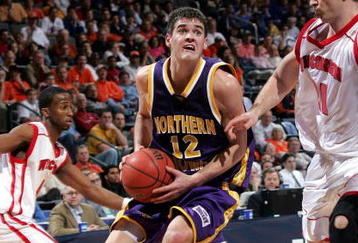 OKLAHOMA CITY - MARCH 18:  Ben Jacobson #12 of the Northern Iowa Panthers drives on Andreas Helmigk #21 of the Wisconsin Badgers in the second half during the first round of the NCAA Men's Basketball Championship on March 18, 2005 at the Ford Center in Oklahoma City, Oklahoma.  (Photo by Ronald Martinez/Getty Images)