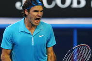 MELBOURNE, AUSTRALIA - JANUARY 27:  Roger Federer of Switzerland celebrates after winning his quarterfinal match against Nikolay Davydenko of Russia during day ten of the 2010 Australian Open at Melbourne Park on January 27, 2010 in Melbourne, Australia.  (Photo by Cameron Spencer/Getty Images)