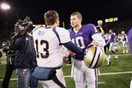 SEATTLE - DECEMBER 05:  Quarterback Jake Locker #10 of the Washington Huskies is congratulated by Kevin Riley #13 of the California Bears after the game on December 5, 2009 at Husky Stadium in Seattle, Washington. The Huskies defeated the Bears 42-10. (Photo by Otto Greule Jr/Getty Images)