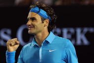 MELBOURNE, AUSTRALIA - JANUARY 29:  Roger Federer of Switzerland celebrates after winning his semifinal match against Jo-Wilfried Tsonga of France during day twelve of the 2010 Australian Open at Melbourne Park on January 29, 2010 in Melbourne, Australia.  (Photo by Quinn Rooney/Getty Images)