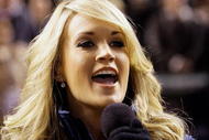 DENVER - OCTOBER 27:  Singer Carrie Underwood performs the National Anthem prior to Game Three of the 2007 Major League Baseball World Series between the Boston Red Sox and the Colorado Rockies at Coors Field on October 27, 2007 in Denver, Colorado.  (Photo by David J. Philp-Pool/Getty Images)