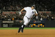 NEW YORK - NOVEMBER 04: Johnny Damon #18 of the New York Yankees rounds third and scores in the bottom of the third inning against the Philadelphia Phillies in Game Six of the 2009 MLB World Series at Yankee Stadium on November 4, 2009 in the Bronx borough of New York City. (Photo by Nick Laham/Getty Images)