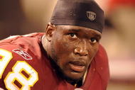 BALTIMORE, MD - AUGUST 13:  Brian Orakpo #98 of the Washington Redskins looks on during a NFL preseason football game against the Baltimore Ravens on August 13, 2009 at M & T Bank Stadium in Baltimore, Maryland.   (Photo by Mitchell Layton/Getty Images)