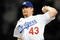 LOS ANGELES, CA - OCTOBER 02:  Randy Wolf #43 of the Los Angeles Dodgers pitches against the Colorado Rockies during the first inning on October 2, 2009 in Los Angeles, California.  (Photo by Harry How/Getty Images)