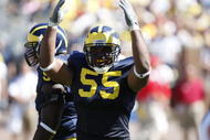 ANN ARBOR, MI - SEPTEMBER 6:  Defensive end Brandon Graham #55 of the Michigan Wolverines raises his arms during the game against the Miami of Ohio Red Hawks on September 6, 2008 at Michigan Stadium in Ann Arbor, Michigan.  The Wolverines defeated the Red Hawks 16-6. (Photo by Gregory Shamus/Getty Images)