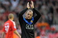 LIVERPOOL, ENGLAND - OCTOBER 25: Wayne Rooney (R) and Michael Owen of Manchester United applaud the fans at the end of the Barclays Premier League match between Liverpool and Manchester United at Anfield on October 25, 2009 in Liverpool, England. (Photo by Michael Regan/Getty Images)