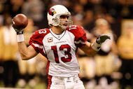 NEW ORLEANS - JANUARY 16:  Quarterback Kurt Warner #13 of the Arizona Cardinals throws a pass against the New Orleans Saints during the NFC Divisional Playoff Game at Louisana Superdome on January 16, 2010 in New Orleans, Louisiana. The Saints won 45-14. (Photo by Ronald Martinez/Getty Images)