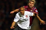 LONDON, ENGLAND - OCTOBER 25:  Gael Clichy of Arsenal battles for the ball with Valon Behrami of West Ham United during the Barclays Premier League match between West Ham United and Arsenal at Boleyn Ground on October 25, 2009 in London, England.  (Photo by Phil Cole/Getty Images)