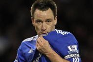 BURNLEY, ENGLAND - JANUARY 30:  John Terry of Chelsea kisses his team's badge at the end of the Barclays Premier League match between Burnley and Chelsea at Turf Moor on January 30, 2010 in Burnley, England.  (Photo by Alex Livesey/Getty Images)