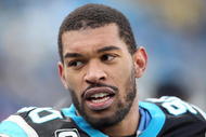 CHARLOTTE, NC - JANUARY 03: Julius Peppers #90 of the Carolina Panthers looks on the sidelines during the game against the New Orleans Saints at Bank of America Stadium on January 3, 2010 in Charlotte, North Carolina. (Photo by Streeter Lecka/Getty Images)