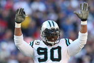 EAST RUTHERFORD, NJ - DECEMBER 27: Julius Peppers #90 of the Carolina Panthers against the New York Giants at Giants Stadium on December 27, 2009 in East Rutherford, New Jersey. (Photo by Nick Laham/Getty Images)