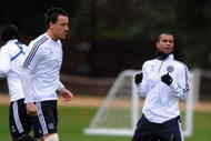 COBHAM, ENGLAND - DECEMBER 07: John Terry, Ashley Cole and Frank Lampard of Chelsea warm up during a Chelsea Training & Press Conference, ahead of their Champions League Group D match against APOEL Nicosia, at the Chelsea training ground on December 7, 2009 in Cobham, England. (Photo by Jamie McDonald/Getty Images)