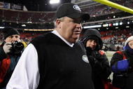 EAST RUTHERFORD, NJ - JANUARY 03:  Rex Ryan, Head Coach of the New York Jets, walks off the field surrounded by media at the end of the fourth quarter in celebration of their 37-0 victory over the Cincinnati Bengals at Giants Stadium on January 3, 2010 in East Rutherford, New Jersey.  (Photo by Jeff Zelevansky/Getty Images)