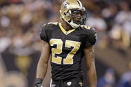 NEW ORLEANS - DECEMBER 27: Malcolm Jenkins #27 of the New Orleans Saints walks on the field during the game against the Tampa Bay Buccaneers on December 27, 2009 at Louisiana Superdome in New Orleans, Louisiana. (Photo by Jamie Squire/Getty Images)