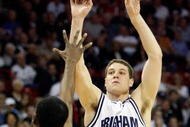 LAS VEGAS - MARCH 12: Jimmer Fredette #32 of the Brigham Young University Cougars shoots over Anwar Johnson #42 of the Air Force Falcons during a quarterfinal game of the Conoco Mountain West Conference Basketball Championships at the Thomas & Mack Center March 12, 2009 in Las Vegas, Nevada. The Cougars won 80-69. (Photo by Ethan Miller/Getty Images)