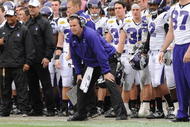 TAMPA, FL - JANUARY 1: Coach Pat Fitzgerald of the Northwestern Wildcats directs play against the Auburn Tigers in the Outback Bowl January 1, 2010 at Raymond James Stadium in Tampa, Florida. (Photo by Al Messerschmidt/Getty Images)
