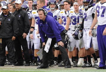 TAMPA, FL - JANUARY 1: Coach Pat Fitzgerald of the Northwestern Wildcats directs play against the Auburn Tigers in the Outback Bowl January 1, 2010 at Raymond James Stadium in Tampa, Florida.  (Photo by Al Messerschmidt/Getty Images) 