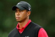 FARMINGDALE, NY - JUNE 22: Tiger Woods looks on as he walks down the tenth fairway during the continuation of the final round of the 109th U.S. Open on the Black Course at Bethpage State Park on June 22, 2009 in Farmingdale, New York. (Photo by Ross Kinnaird/Getty Images)