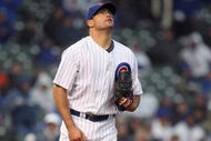 CHICAGO - APRIL 13: Kevin Gregg #63 of the Chicago Cubs looks up from the mound against the Colorado Rockies during the Opening Day game on April 13, 2009 at Wrigley Field in Chicago, Illinois. The Cubs defeated the Rockies 4-0. (Photo by Jonathan Daniel/Getty Images)