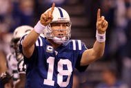 INDIANAPOLIS - JANUARY 24: Quarterback Peyton Manning #18 of the Indianapolis Colts reacts during the first half against the New York Jets during the AFC Championship Game at Lucas Oil Stadium on January 24, 2010 in Indianapolis, Indiana. The Colts defeated the Jets 30-17. (Photo by Elsa/Getty Images)