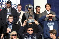 NEW YORK - NOVEMBER 06: Captain Derek Jeter #2 of the New York Yankees celebrates with the championship trophy during the New York Yankees World Series Victory Celebration at City Hall on November 6, 2009 in New York, New York. (Photo by Jim McIsaac/Getty Images)